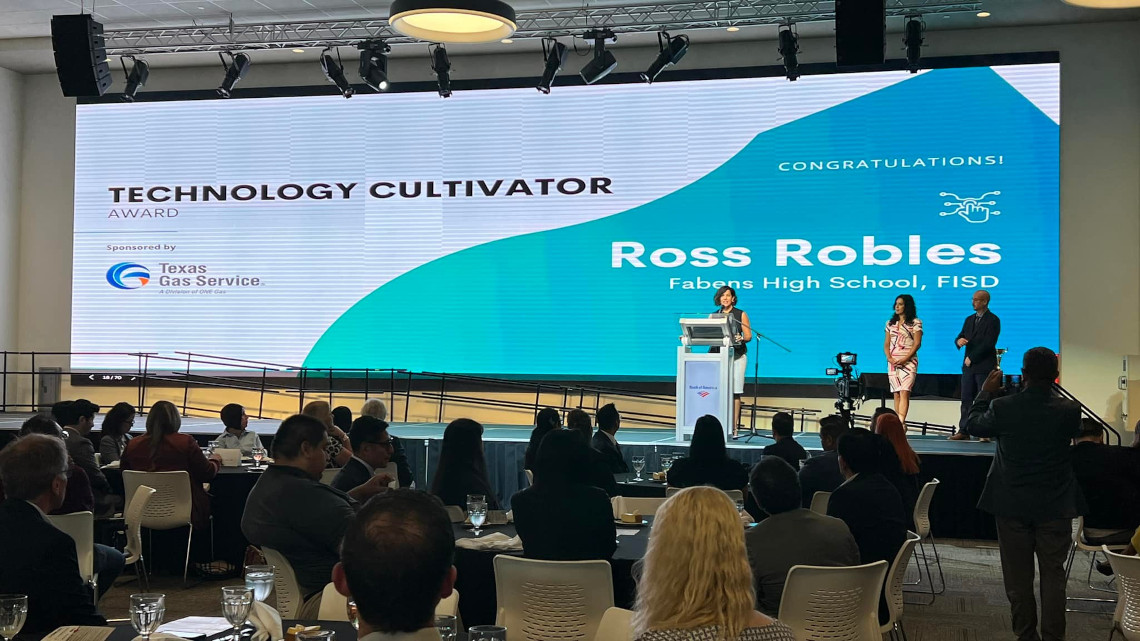 Texas Gas Service Technology Cultivator presents award to Ross Robles